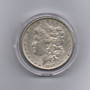 1889 Silver Morgan Dollar... AU... In Protective Capsule